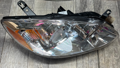 2003-08 Toyota Corolla Amber Chrome Housing Right Headlight