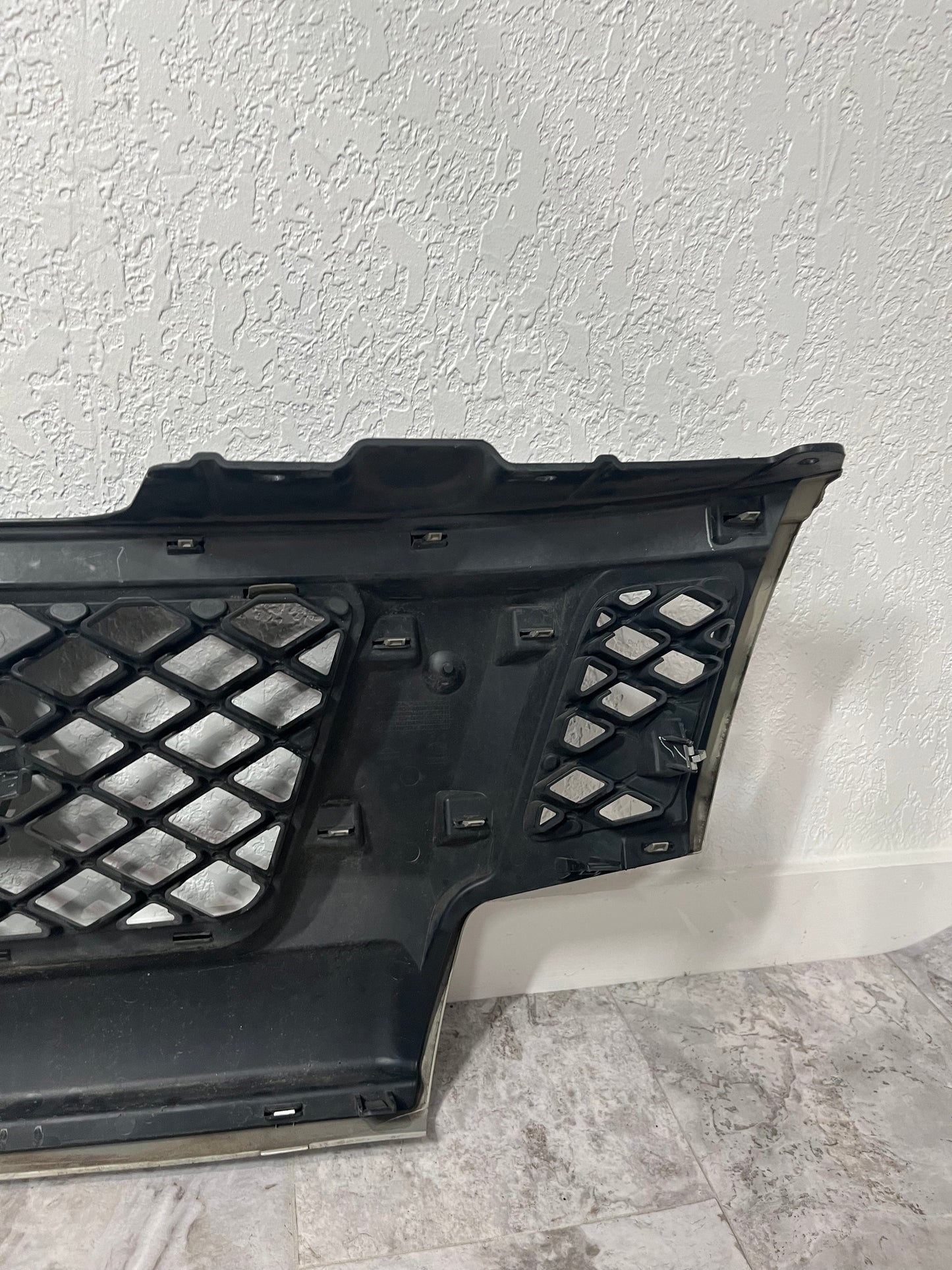 2009-13 Nissan Frontier Front Upper Grille OEM