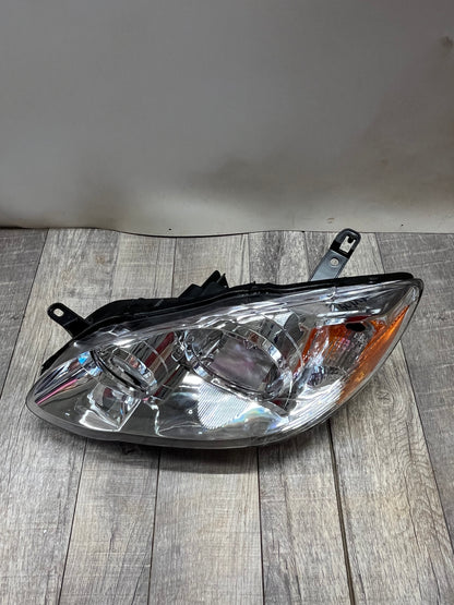 2003-08 Toyota Corolla Amber Chrome Housing Left Headlight