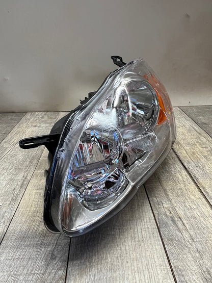 2003-08 Toyota Corolla Amber Chrome Housing Left Headlight